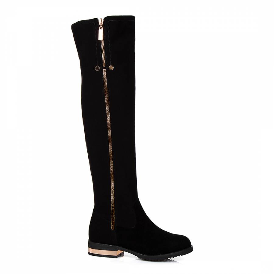 black and gold riding boots