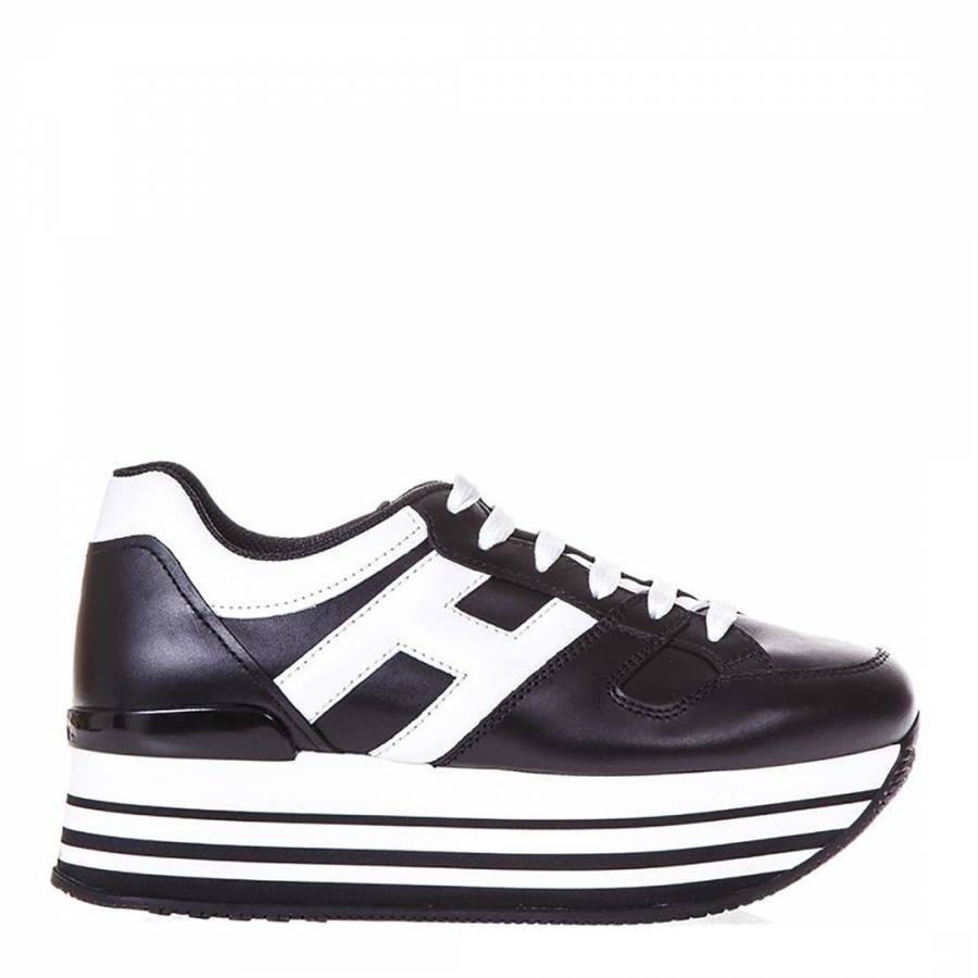 black trainers with white stripe