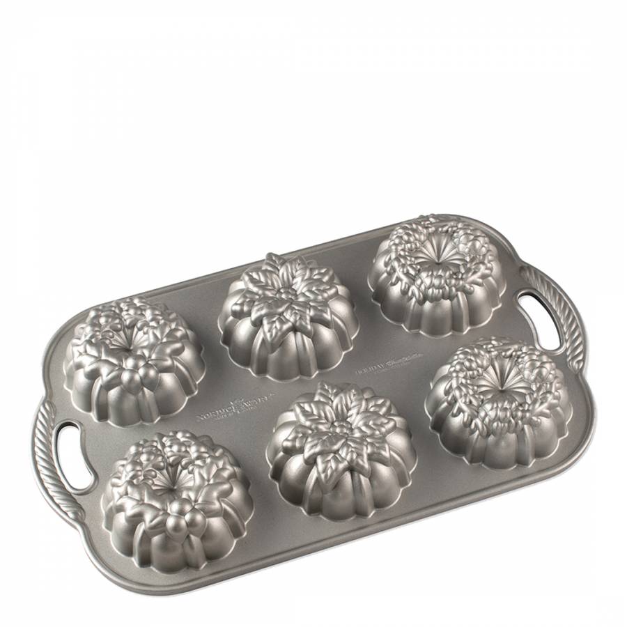  Nordic Ware Nutcracker Sweets Cast Cakelet Pan, 6 Cup Capacity,  Silver: Home & Kitchen