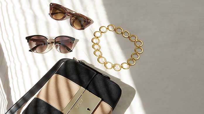 Accessories Under £50 Delve into your designer addiction with luxury accessories for less. On a budget? No problem, each ensemble is under £50. Shop the best of Kate Spade, Coach, DKNY & friends.