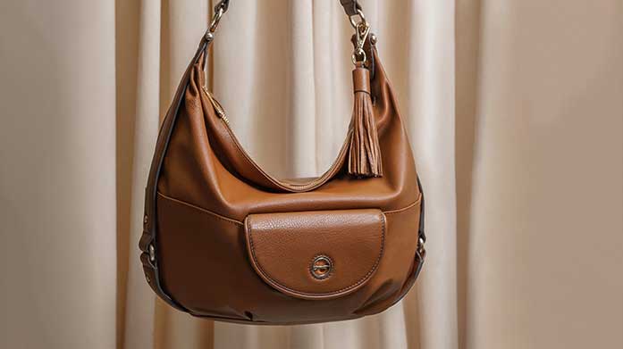 Paul Costelloe New Collection The Paul Costelloe collection offers effortless elegance through high-quality accessories including luxury handbags and purses, crafted to perfection.