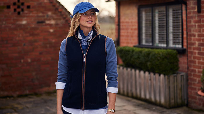 Country Escape For Her Stay warm and dry in the countryside this December. Shop padded & hooded puffer coats, thick wool-blend jumpers and stretchy, insulating base layers from Schoffel and LeMieux.